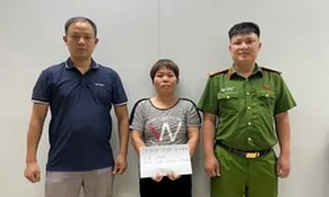 Lê Thị Nhàn 50 tuổi về Việt Nam đầu thú