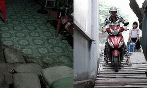 Cảnh tượng lạ trên con đường 93 tỷ đồng ở TP.HCM: Nhà dân lọt thỏm, xe máy phải xuống dốc